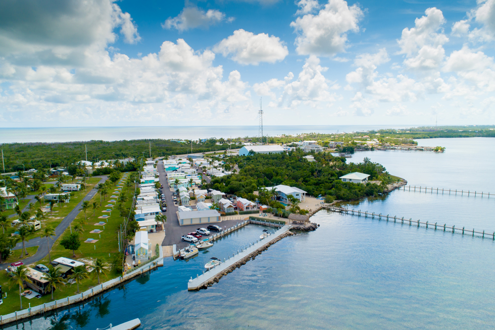 Sun Outdoors Marathon RV park with full hookup sites, ocean views, and palm trees in Marathon, Florida Keys