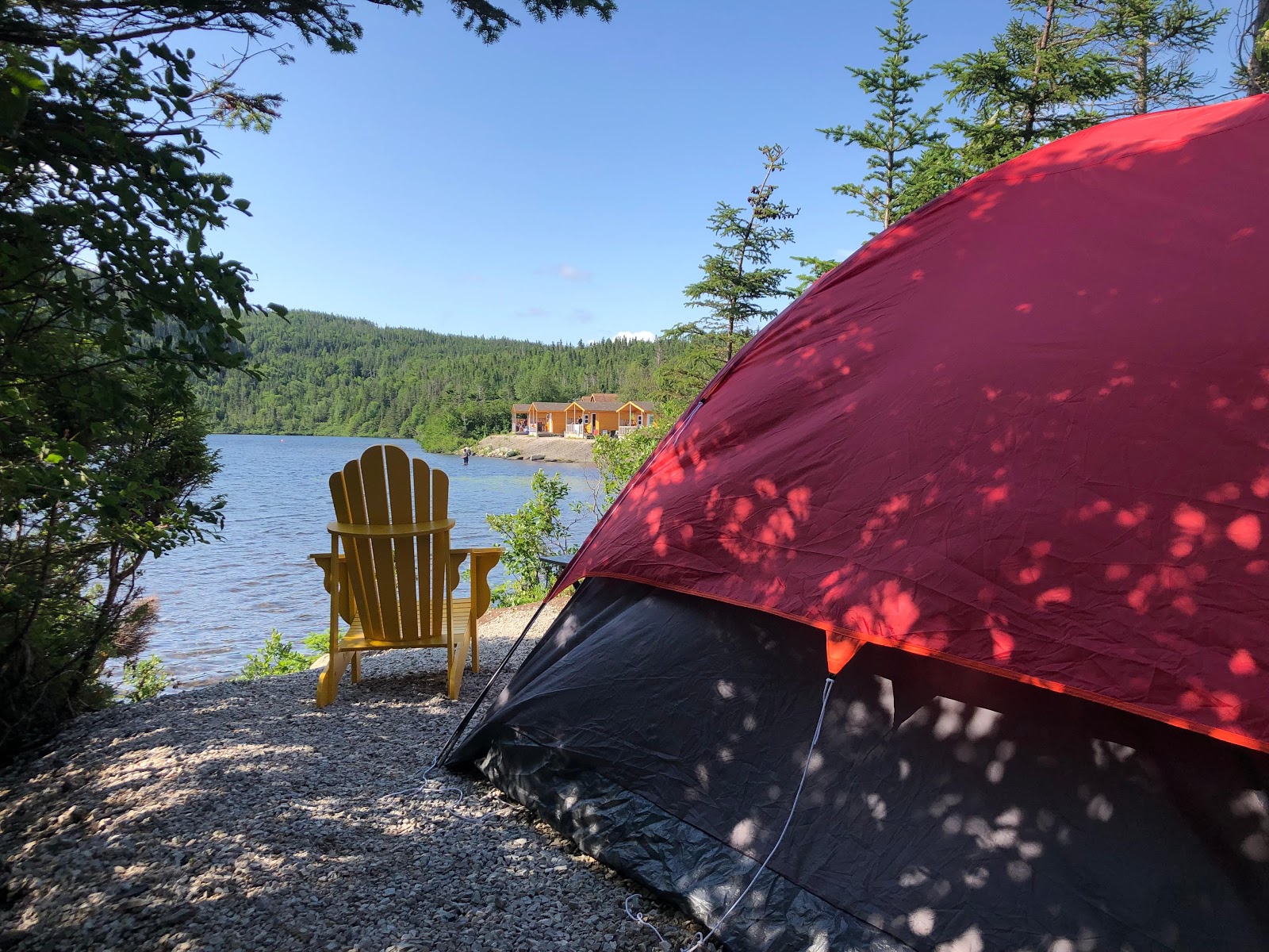 KOA Holiday campground with RV sites and mountain backdrop