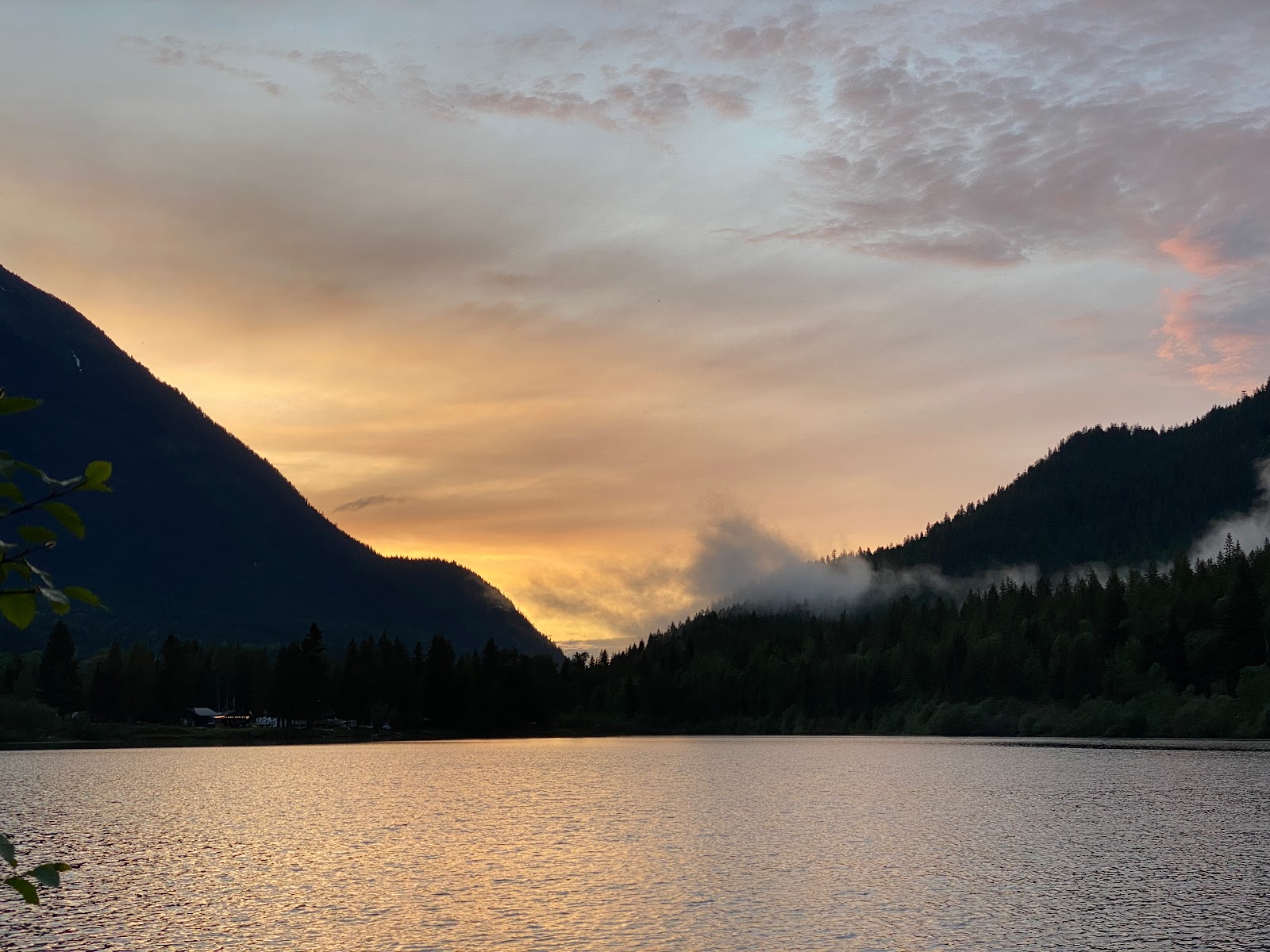 Summit Lake surrounded by mountain peaks