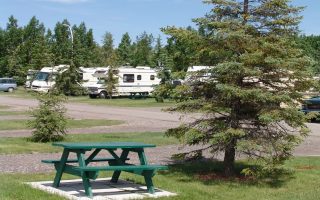 Mountain View Camping RV park with mountain backdrop