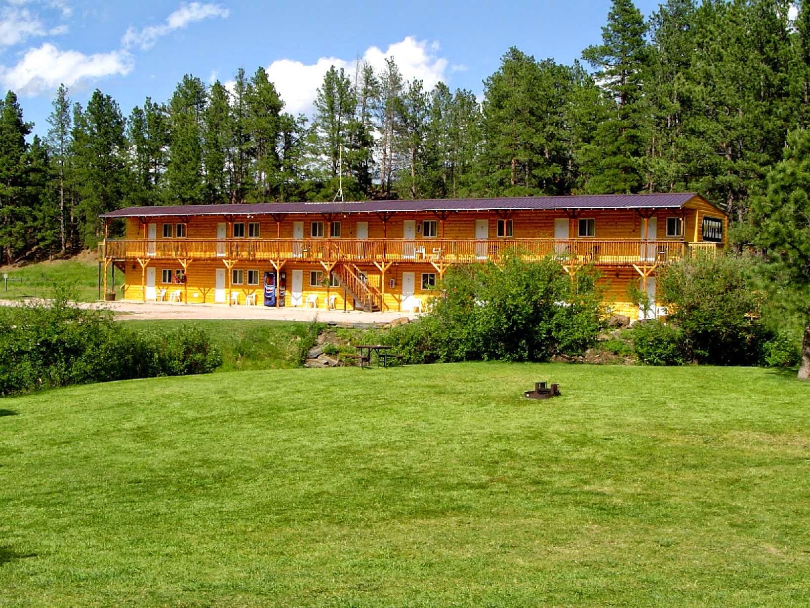 Larsson's Crooked Creek RV Resort with scenic mountain backdrop